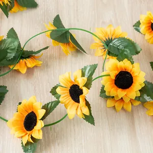 Artificial sunflower vine garland for home wedding ceiling decoration, vibrant yellow floral decor.