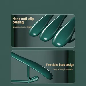 Anti-slip dipped clothes hangers with wide shoulder design and side hooks for seamless home storage.