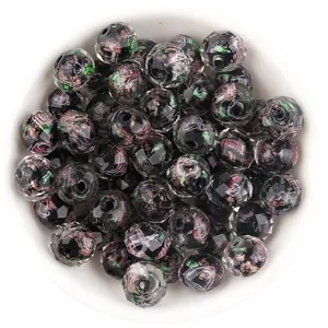 Faceted millefiori glass beads with gold sand and floral patterns for DIY handmade jewelry.