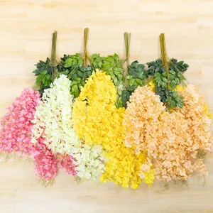 Artificial wisteria flower vine for wedding background, ceiling decor and party decoration.