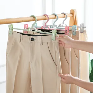 Multi-functional adjustable plastic pants hangers with non-slip clips for closet storage