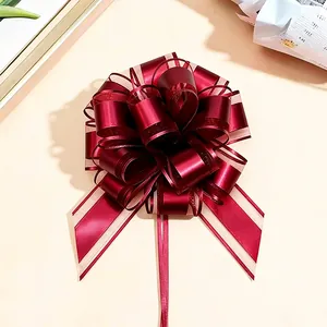 Elegante bordeauxrote matte metallische Zugschleife für Weihnachtsgeschenkdeko