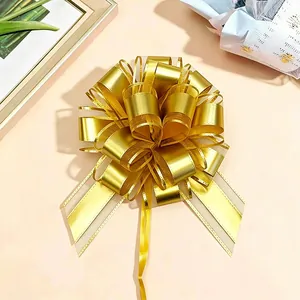 Eine hochwertige 30# goldene metallische matte Ziehschleife für elegante Geschenke Dekoration.