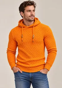 Detailed view of men's orange waffle knit hoodie with textured pattern and drawstring