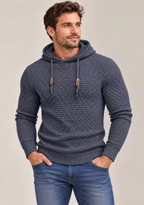 Detailed view of men's textured knit hoodie in navy blue with drawstring accents