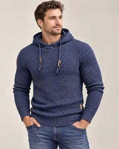High quality detail view of a men's blue waffle knit hoodie with a textured drawstring hood