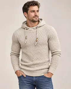 Close-up of men's beige waffle knit hooded sweater showing texture and drawstring