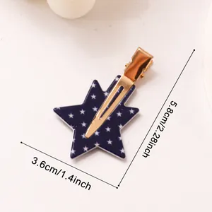 Dettaglio di un fermaglio per capelli a stella blu navy con misure in cm e pollici.