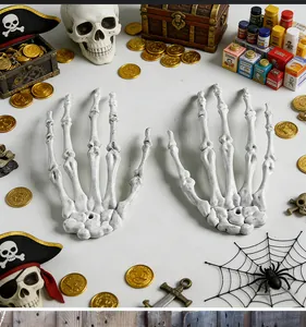 Life-sized realistic Halloween skeleton bone hands decoration in pirate treasure scene