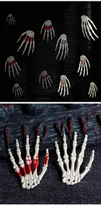 Detailed macro shot of plastic Halloween skeleton hands with realistic bone texture