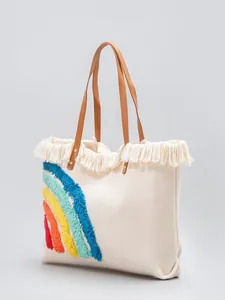 Große cremefarbene Canvas-Einkaufstasche mit bunter Regenbogenstickerei und Fransen