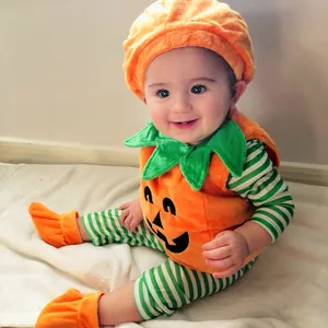 Baby Halloween pumpkin costume detail view, cute infant holiday outfit with matching hat and socks.