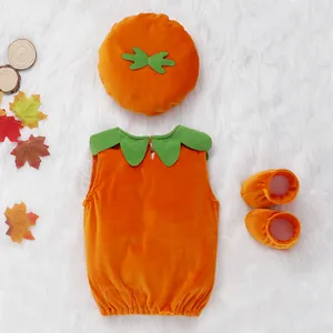Detailed flat lay view of cute baby pumpkin romper costume set with matching hat and shoes.