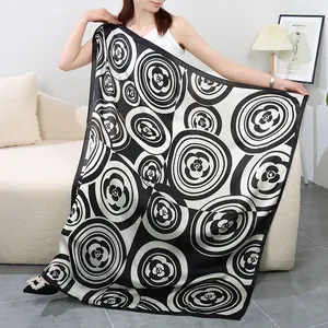 Black and white large square scarf for women, elegant camellia print silk-like fashion wrap.