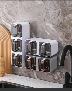 Modern wall-mounted spice rack set with labels and pull-out drawers in kitchen