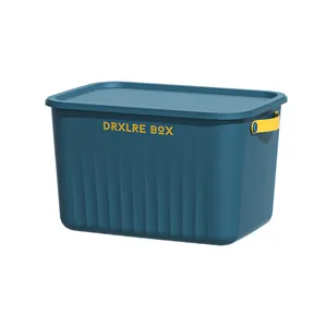 Caja de almacenamiento azul con tapa y asas amarillas para organizar el hogar