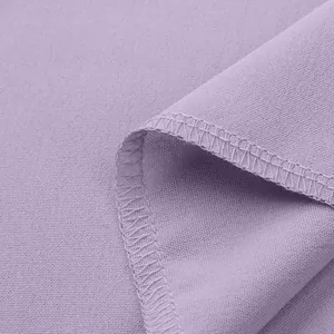 Lavender purple fabric detail close-up showing fine texture and neat overlock stitching.