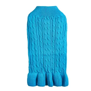 Close-up detail of soft cable knit blue pet sweater texture for small dogs winter wear.
