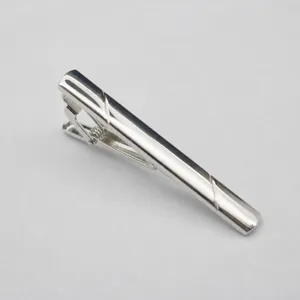 Silver metal tie clip detail shot, elegant business men neckwear accessory and hardware.