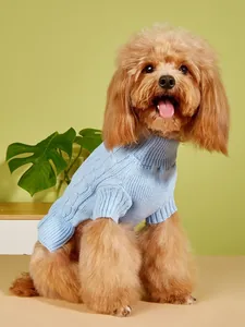 Detail shot of light blue cable-knit pet sweater for small dogs, soft and warm winter wear.