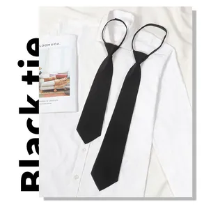 Close-up of black zipper tie, convenient lazy necktie detail display on crisp white shirt.