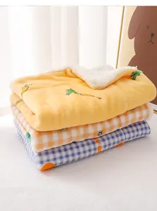 Cozy plush pet winter mat and fluffy blanket with cute carrot and plaid design for cats.