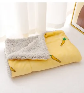 Cozy thick pet sleeping mat with cute carrot pattern and soft grey sherpa backing for winter.