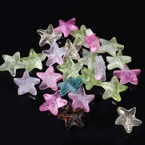 Close-up of colorful translucent starfish glass beads, ideal for DIY charms and jewelry.