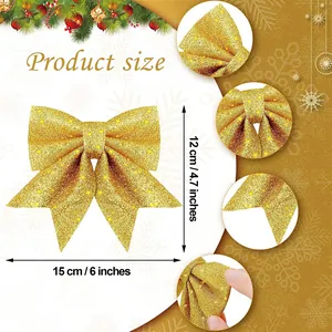 Gouden glitter kerststrik detailweergave, close-up opname van feestelijke boomversiering.