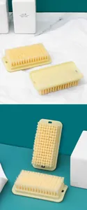 Detailed macro view of soft nylon bristles on a durable plastic laundry brush