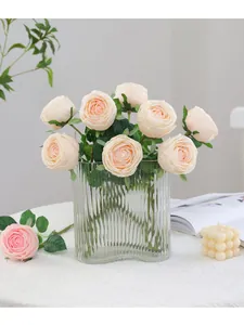 Artificial rose bouquet with clear glass vase, premium faux flowers for home and wedding decor.