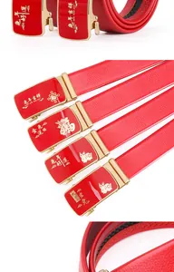 Red men leather belt detail view showcasing golden automatic buckle with lucky rabbit design.