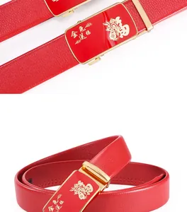 Red leather men belt detail featuring gold automatic buckle with rabbit and fortune design.