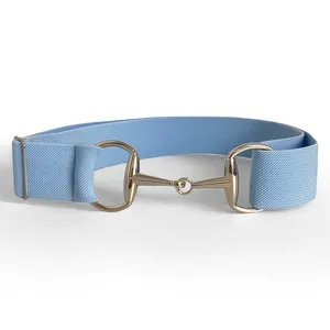 Detailed view of the elastic stretch belt featuring a luxurious golden horsebit metal buckle.