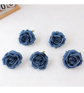 Blue artificial rose heads, perfect for DIY wedding crafts and home decor projects.