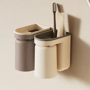 Wall-mounted punch-free toothbrush holder with magnetic cups for bathroom storage