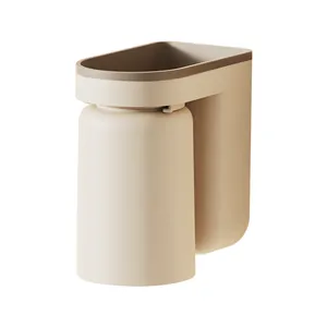 Minimalist wall-mounted toothbrush holder with a cream beige magnetic mouthwash cup
