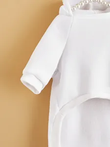 White fleece pet hoodie detail shot, soft warm winter dog and cat sweatshirt close-up view