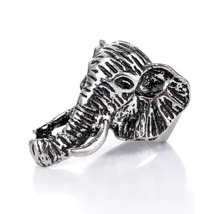 Vintage elephant ring detail shot, retro punk style animal jewelry, adjustable silver ring.