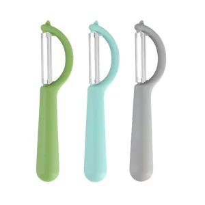 Set of three ergonomic stainless steel vegetable peelers in vibrant green, cyan and gray