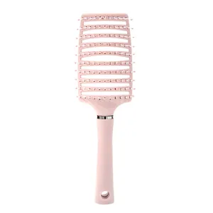 Professional pink vented hairbrush for voluminous hair styling and scalp massage