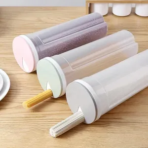 Transparent plastic noodle storage containers with colored lids for kitchen organization