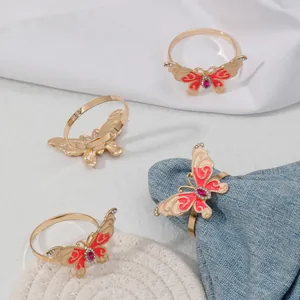 Gold butterfly napkin rings with pink enamel and rhinestones set of four table decor