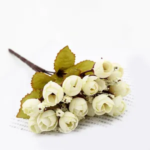 Detailed view of artificial mini rose bouquet, perfect flower decoration for wedding and home.