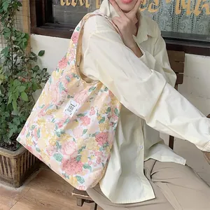 Summer floral canvas tote bag, large capacity casual shoulder shopping bag for women daily use.