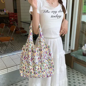 Cute floral canvas tote bag for women, large capacity shoulder bag for college daily commute.