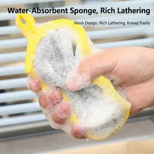 Double-sided yellow cleaning sponge with mesh cover producing rich soapy foam