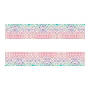 Détail du motif d'écailles de sirène rose et violet pour des serviettes en papier