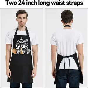 Detailed view of black apron featuring funny text graphic and adjustable long waist straps.