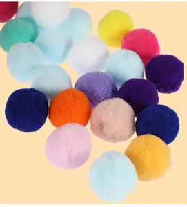 Close-up detail of soft colorful plush balls for interactive cat toy launcher accessories